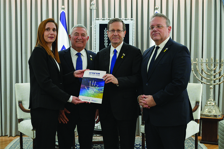 Dr. Raheli Baratz, Head of the Department for Combating Antisemitism and Community Resilience at the World Zionist Organization; Chairman of The Jewish Agency, Maj. Gen. (Res.) Doron Almog; and Chairman of the World Zionist Organization, Yaakov Hagoel; present their 2024 Antisemitism Report to President of Israel Isaac Herzog